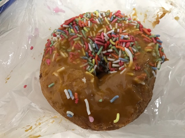 Ruined icing of a day-old iced doughnut